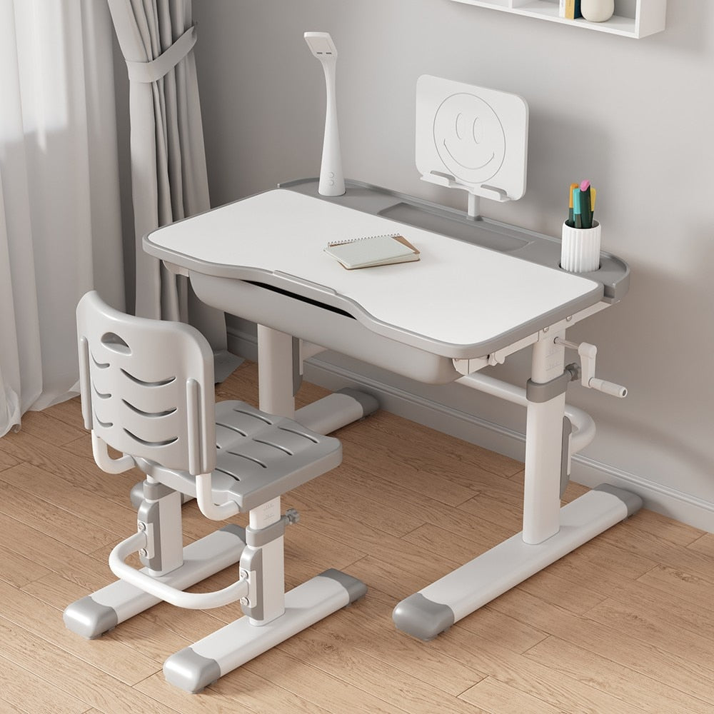 https://www.lyhoe.com/cdn/shop/products/Kids-Study-Desk-and-Chair-Set-Height-Adjustable-Children-School-Writing-Functional-Study-Table-with-Drawers.jpg?v=1673961722